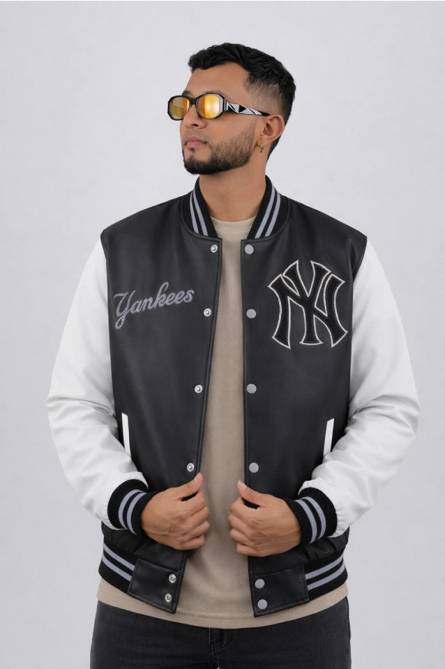 Chaqueta Bomber beisbolera New York para hombre en color negro vista frontal con logos bordados de estilo y material Cuerotex resistente. Disponible con Pago Contra Entrega, crédito ADDI y Sistecrédito en lsjsas.com
