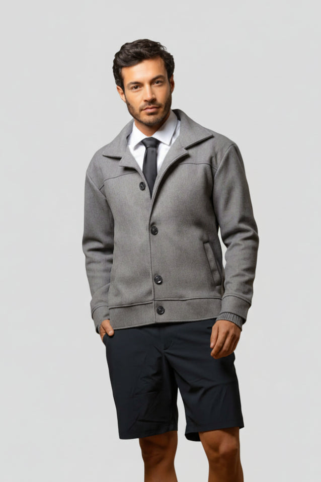 Chaqueta Heros en paño licrado gris, diseño de estructura moderna que no restringe el movimiento gracias a su tejido elástico. Disponible en Colombia con pago al recibir en casa y Sistecrédito.