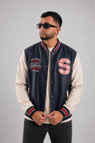 Chaqueta Bomber beisbolera para hombre vista frontal  en color azul con logos bordados  y material Cuerotex resistente. Disponible con Pago Contra Entrega, crédito ADDI y Sistecrédito en lsjsas.com