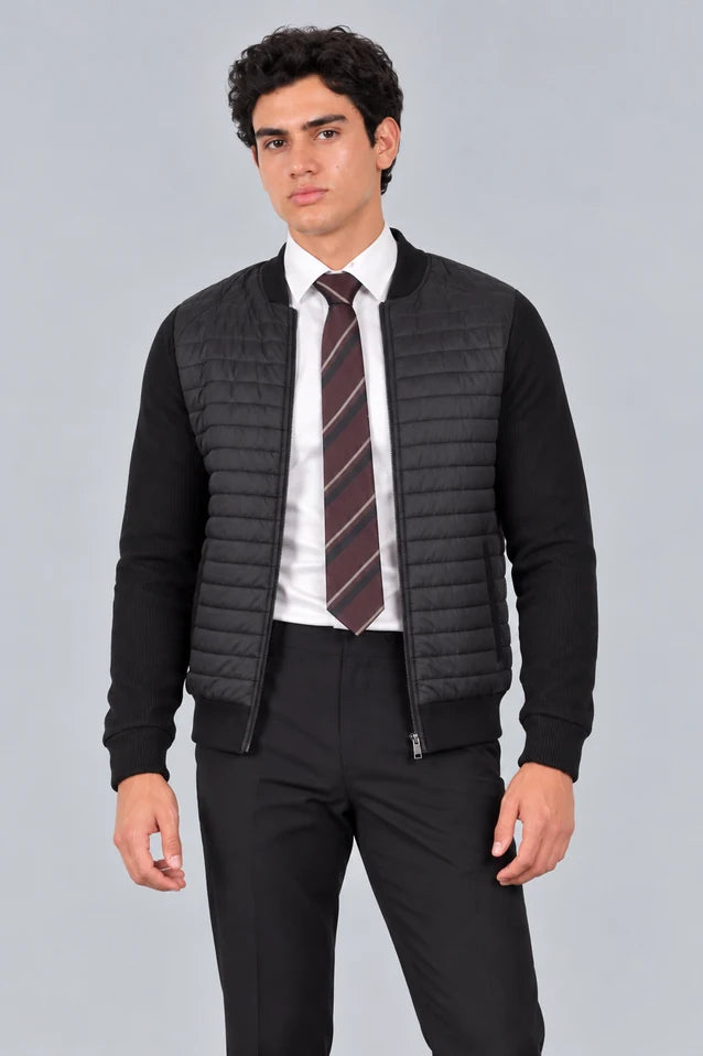 Chaqueta Málaga negra para hombre con frente acolchado y mangas en tejido de punto, vista frontal
